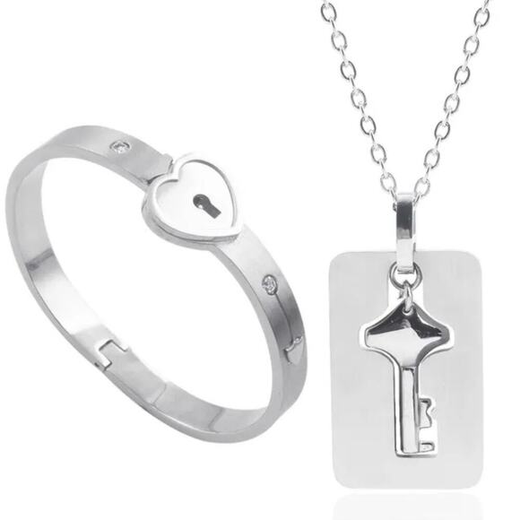 Stainless steel locking silver bracelet with key necklace and heart shape lock - Picture 1 of 3